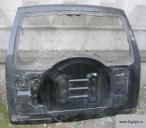 Mitsubishi Pajero/Montero 4 Дверь багажника Mitsubishi Pajero Montero IV V8, V9 2007>. Оригинальная крышка багажника. В наличии 2 шт. на выбор. Номер детали по каталогу: 5821A100 б/у запчастина в наявності (розбирання)